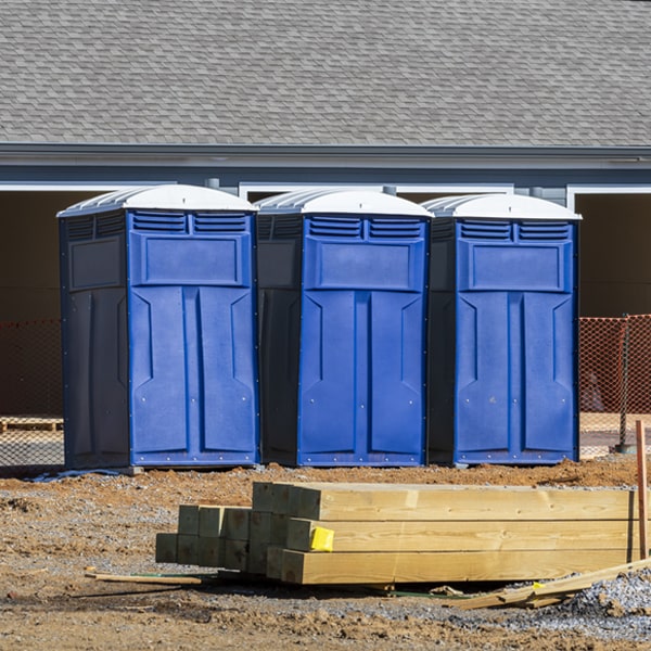 what is the cost difference between standard and deluxe portable restroom rentals in Economy Indiana